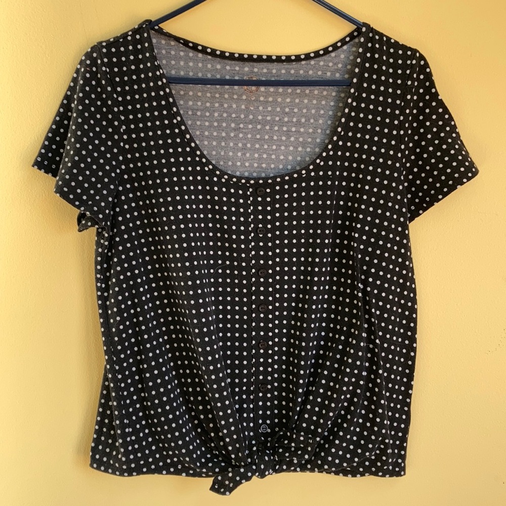 Black white polka dot shirt.